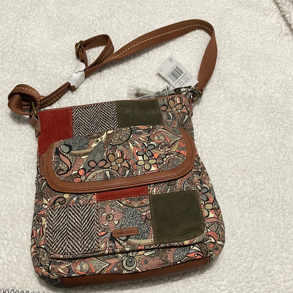 Sakroots multi color patch work purse.